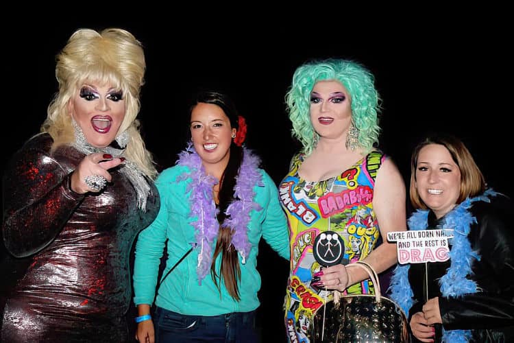 Drag queens with attendees